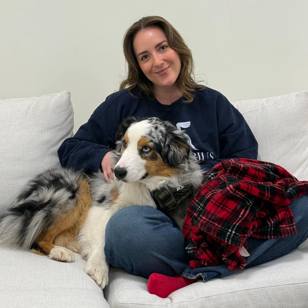 A Caladrius therapist with her dog at our Charlotte office